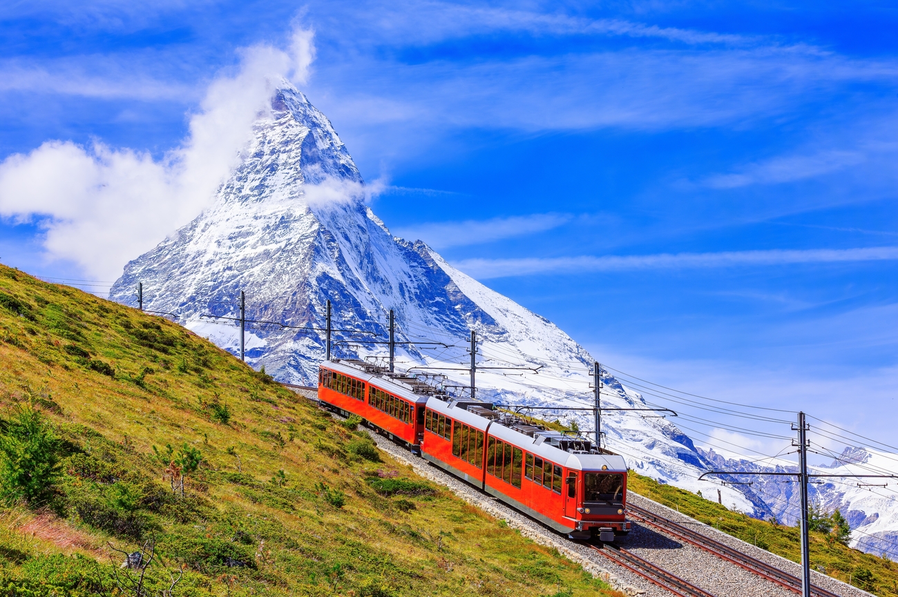 Gornergrat tourist train with Matterhorn mountain in the background, Zermatt, Switzerland Gornergrat tourist train with Matterhorn mountain in the background, Zermatt, Switzerland