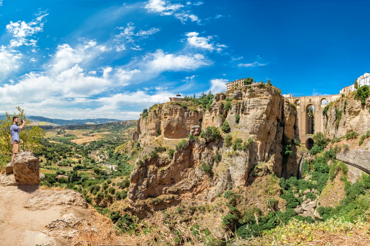 Ronda's Enchanting Landscape: Puente Nuevo Bridge and Cliffside Homes in Spain Ronda's Enchanting Landscape: Puente Nuevo Bridge and Cliffside Homes in Spain